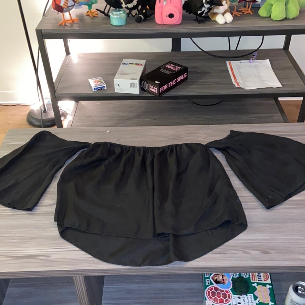 black cropped off the shoulder top